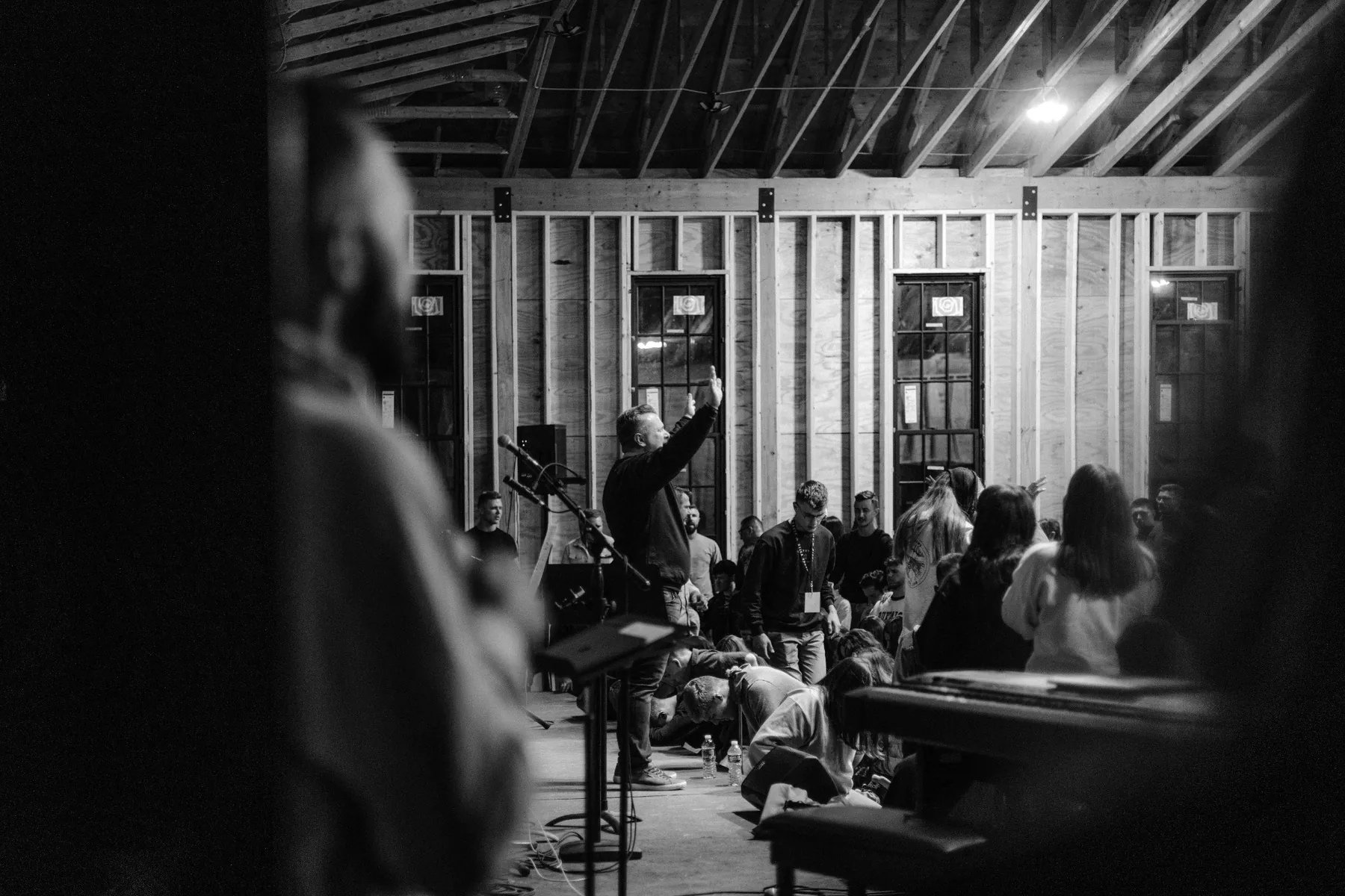 A church community gathered together in prayer